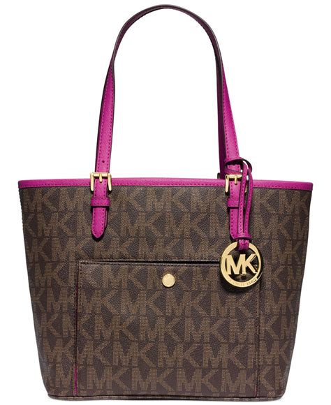 michael kors jet set medium pocket tote bag|Michael Kors bag with airplanes.